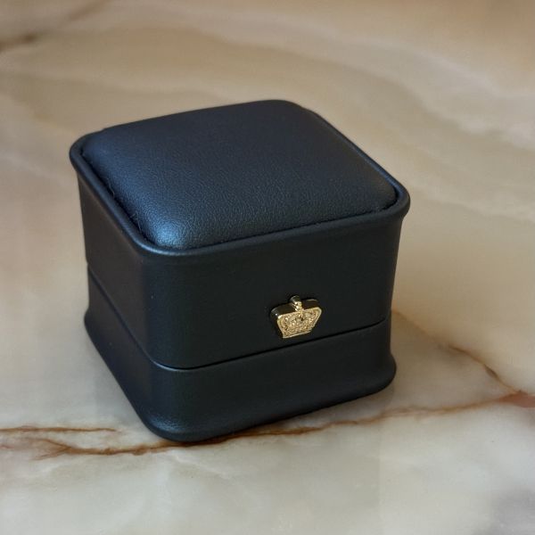 Шкіряна коробочка для каблучок смарагдова